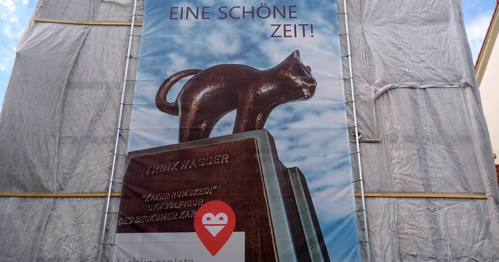 Werbeagentur Beckum Kommunikativ - Bild des Fassadenbanners am Marktplatz in Beckum, welches kommunikativ im Jahre 2022 im Auftrag der Stadt beckum erstellt hat.